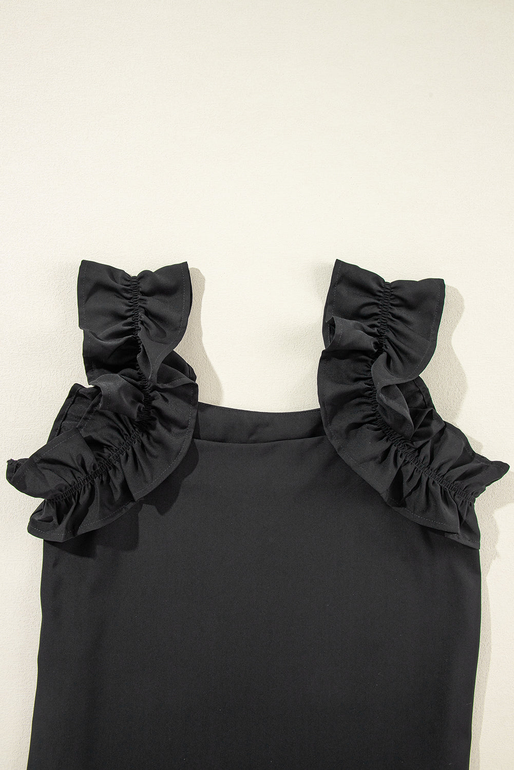 Ruffle Sleeveless Blouse